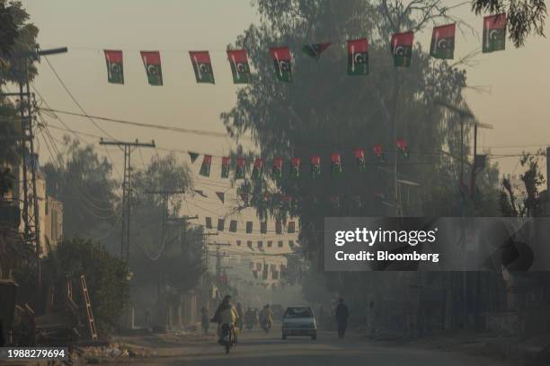 Traffic in early morning fog during Pakistan's general election in Lakarna, Pakistan, on Thursday, Feb. 8, 2024. Pakistan suspended mobile phone...