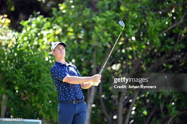 Oliver Hundeboll of Denmark plays his shot from the fourth tee during day one of the Bain's Whisky Cape Town Open at Royal Cape Golf Club on February...