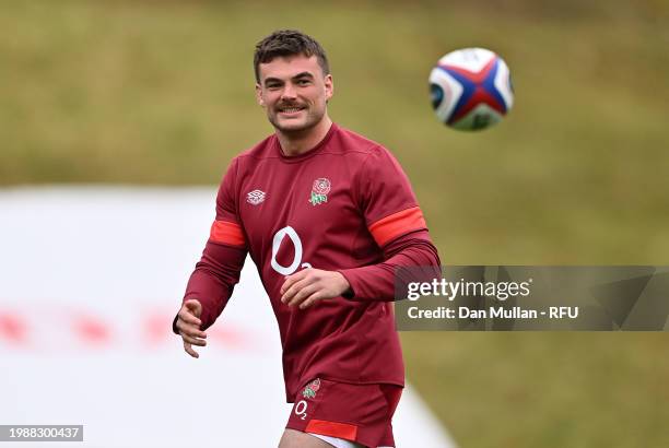 George Furbank of England receives a pass during a training session at Pennyhill Park on February 05, 2024 in Bagshot, England.