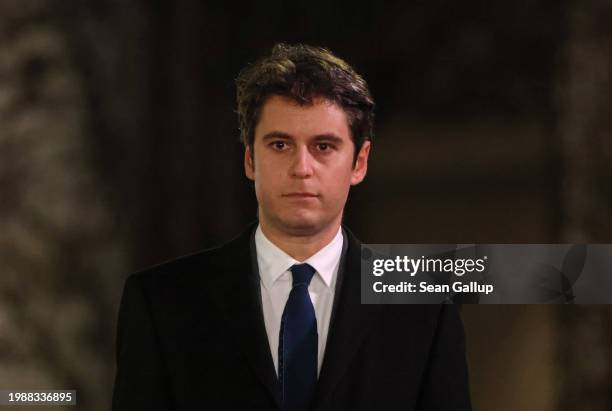 New French Prime Minister Gabriel Attal and German Chancellor Olaf Scholz review a guard of honour upon Attal's arrival at the Chancellery on...