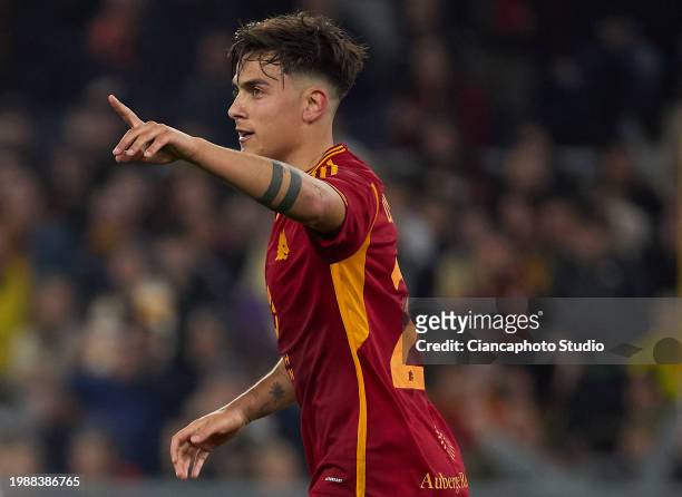 Paulo Dybala of AS Roma celebrates after scoring his team's second goal during the Serie A TIM match between AS Roma and Cagliari at Stadio Olimpico...
