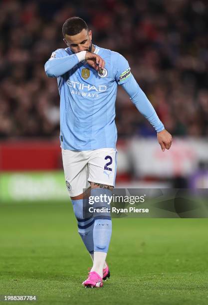 Kyle Walker of Manchester City looks on during the Premier League match between Brentford FC and Manchester City at Brentford Community Stadium on...