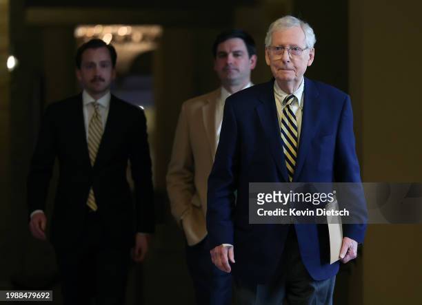 Senate Minority Leader Mitch McConnell walks to the Senate chamber at the U.S. Capitol on February 05, 2024 in Washington, DC. The Senate is working...
