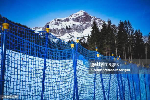 ski slope protection net in the mountains - safety net stock pictures, royalty-free photos & images