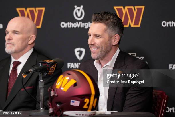 General manager Adam Peters of the Washington Commanders listens to a question from a reporter during an introductory press conference for head coach...