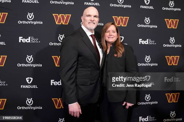 Head coach Dan Quinn of the Washington Commanders poses for a photo with his wife following an introductory press conference at OrthoVirginia...