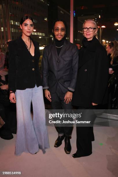 Zoe Helali, Jerry Hoffmann and Christiane Arp attend the Marke X NEWEST Fashion Show at Pressecafe on February 05, 2024 in Berlin, Germany.
