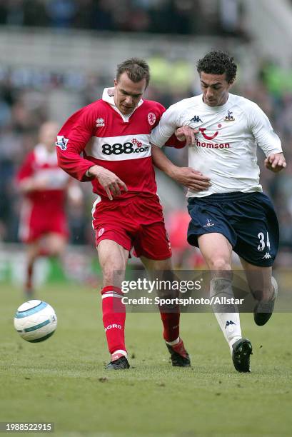 May 7: Szilard Nemeth of Middlesbrough and Stephen Kelly of Tottenham Hotspur challenge during the Premier League match between Middlesbrough and...