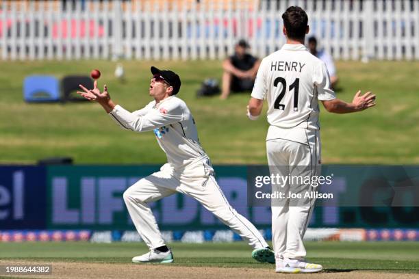 Mitchell Santner of New Zealand takes a catch to dismiss David Bedingham during day three of the First Test in the series between New Zealand and...