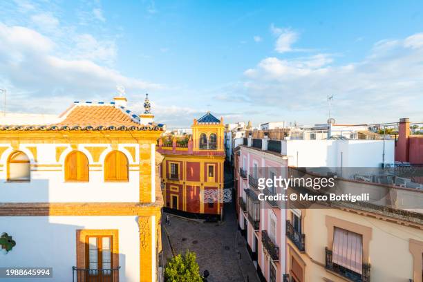 seville skyline at sunset, high angle view, seville, spain - seville landscape stock pictures, royalty-free photos & images