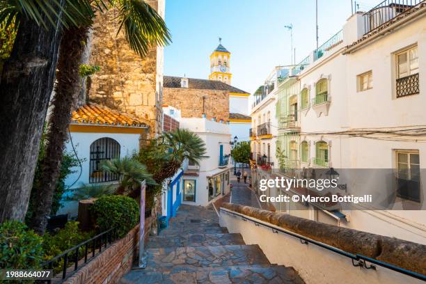 pedestrian streets in the the cozy old town of marbella, spain - málaga province stock pictures, royalty-free photos & images