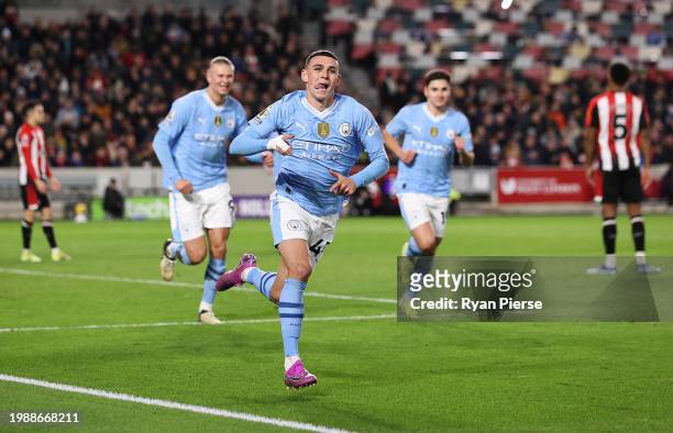 Phil Foden of Manchester City celebrates scoring his team's second goal during the Premier League match between Brentford FC and Manchester City at...