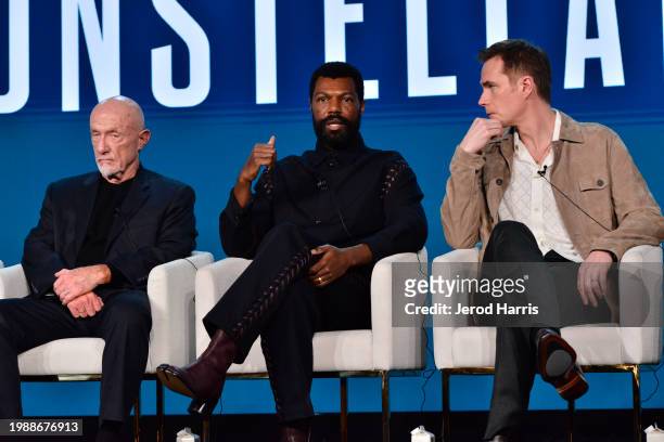 Jonathan Banks, Will Catlett and James D'Arcy speak on stage at the Apple TV+ presentation of "The Reluctant Traveler With Eugene Levy" during the...