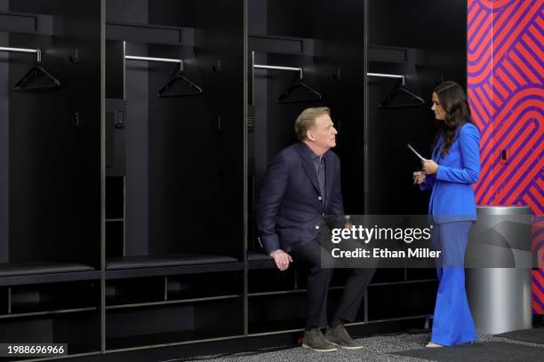 Commissioner Roger Goodell and reporter Tracy Wolfson wait for the start of a press conference ahead of Super Bowl LVIII at Allegiant Stadium on...