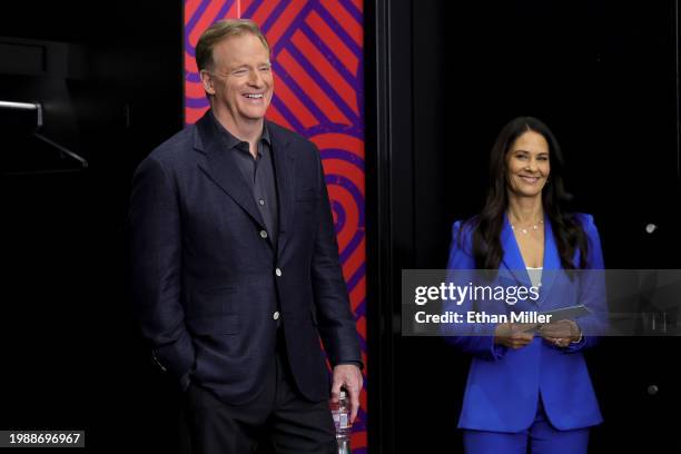 Commissioner Roger Goodell and reporter Tracy Wolfson wait for the start of a press conference ahead of Super Bowl LVIII at Allegiant Stadium on...