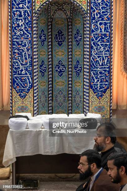 Turbans are being worn during a ceremony at a seminary in Qom, Iran, on February 8, 2024.