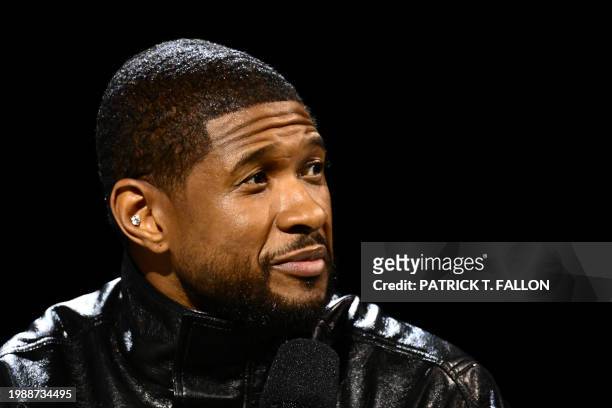 Singer and songwriter Usher speaks during a press conference ahead of Super Bowl LVIII in Las Vegas, Nevada on February 8, 2024. Usher is slated to...