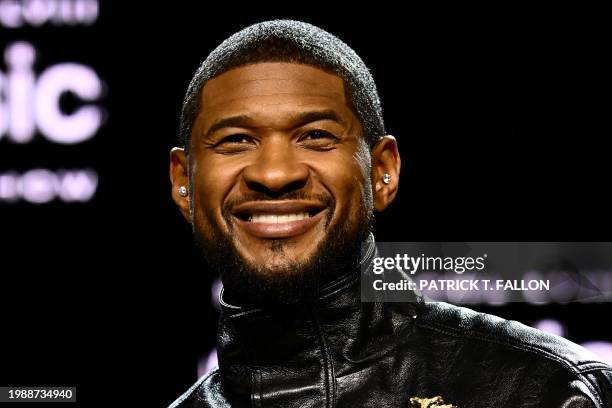 Singer and songwriter Usher arrives to speak during a press conference ahead of Super Bowl LVIII in Las Vegas, Nevada, on February 8, 2024. Usher is...