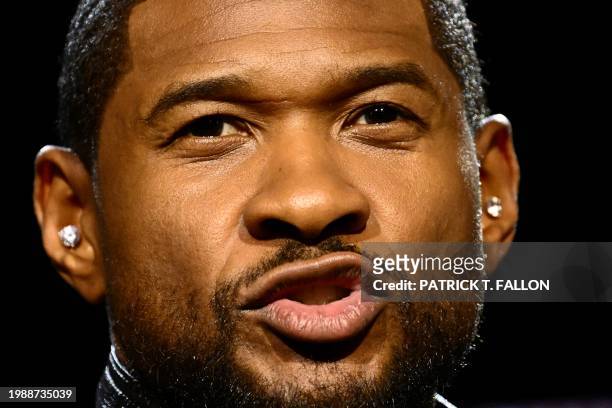 Singer and songwriter Usher speaks during a press conference ahead of Super Bowl LVIII in Las Vegas, Nevada, on February 8, 2024. Usher is slated to...