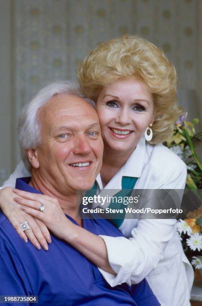 Amercian actress Debbie Reynolds with husband Richard Hamlett in London, England, circa 1985.