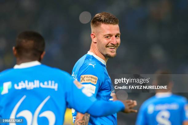 Hilal's Serbian midfielder Sergej Milinkovic-Savic celebrates his goal during the Riyadh Season Cup final match between Al-Nassr and Al-Hilal at the...