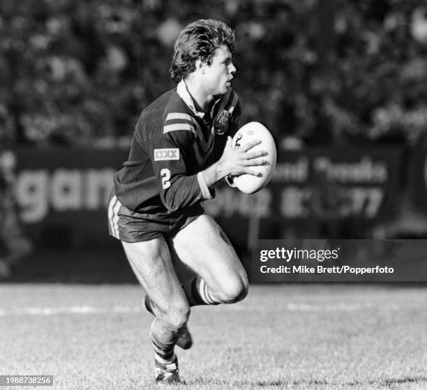 Andrew Ettingshausen of Australia with the ball during the Kangaroos Tour match between Wigan and Australia at Central Park on October 14, 1990 in...