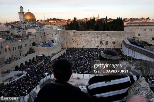 Thousands of Jewish men and women gather during a special prayer in opposition to the US-hosted Middle East peace meeting at the Western Wall,...