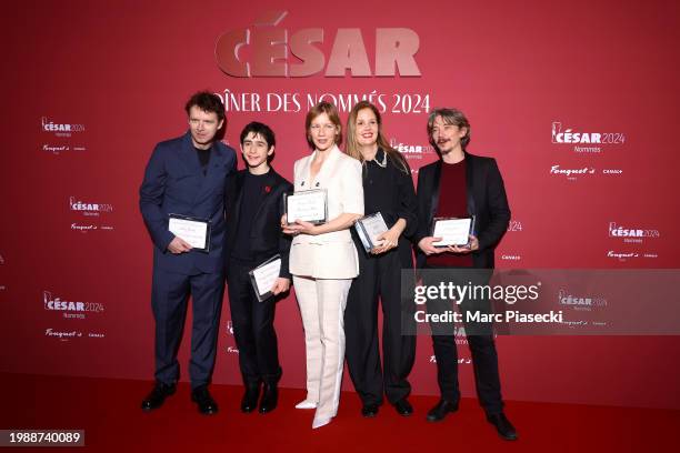 Antoine Reinartz, Milo Machado-Graner, Sandra Hüller, Justine Triet and Swann Arlaud attend the Cesar 2024 - Nominee Dinner at Le Fouquet's on...