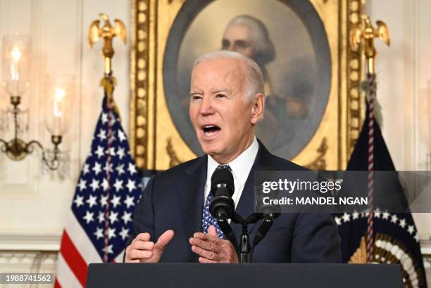 President Joe Biden answers questions about Israel after speaking about the Special Counsel report in the Diplomatic Reception Room of the White...