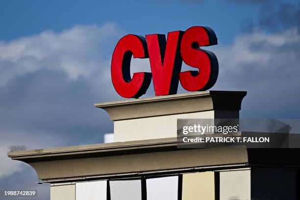 The CVS pharmacy logo is displayed on a sign above a CVS Health Corp. Store in Las Vegas, Nevada on February 7, 2024.