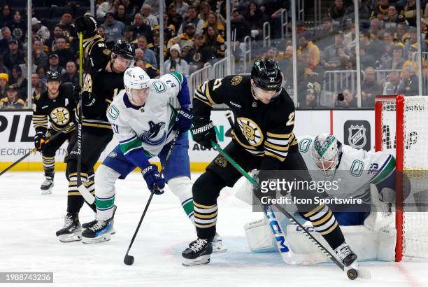 Boston Bruins left wing James van Riemsdyk plays the puck on the power play during a game between the Boston Bruins and the Vancouver Canucks on...