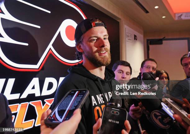 Samuel Ersson of the Philadelphia Flyers speaks to members of the media in the locker room after defeating the Winnipeg Jets 4-1 at the Wells Fargo...