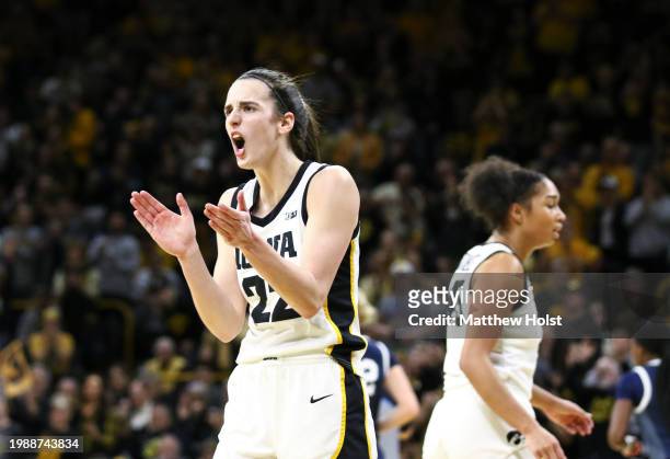 Guard Caitlin Clark of the Iowa Hawkeyes celebrates after a basket during the first half against the Penn State Nittany Lions at Carver-Hawkeye Arena...