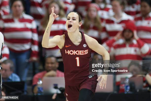 Virginia Tech Hokies guard Carleigh Wenzel celebrates the three point basket during the college basketball game between the NC State Wolfpack and the...