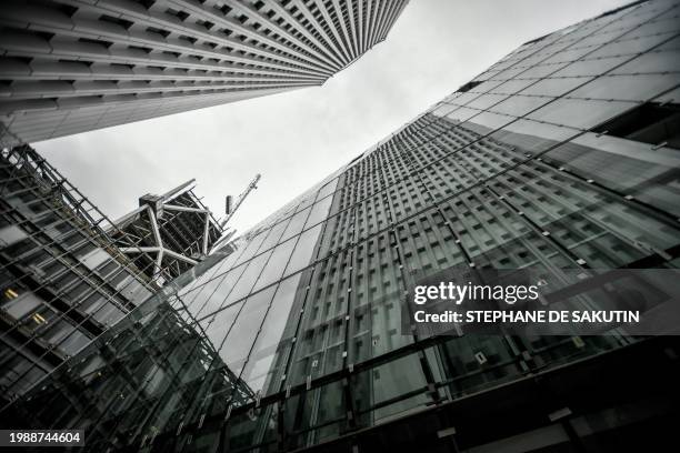 This photograph taken on February 7, 2024 shows a partial view of the Pleyel Tower, formerly an office building undergoing construction work to be...