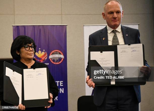 Barry Lefer , National Aeronautics and Space Administration's tropospheric composition programme director, poses for photo with Maria Antonia...