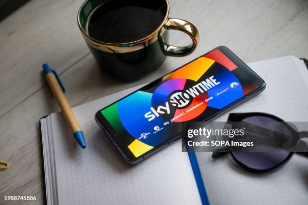 In this photo illustration a Sky Showtime logo seen displayed on a smartphone.