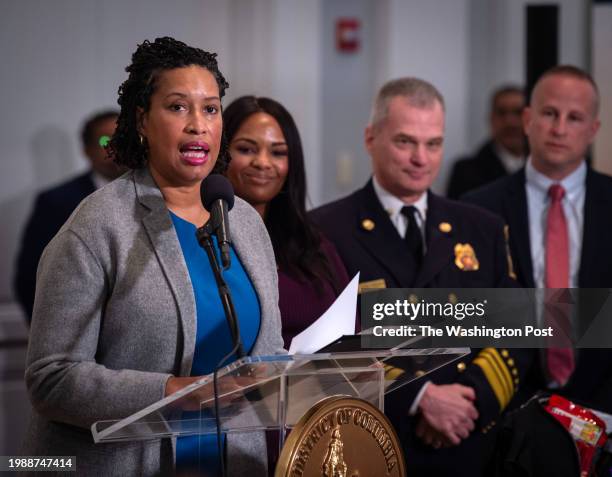 Mayor Muriel Bowser, left, makes remarks as she and DC Fire and EMS Department joins representatives of the American Red Cross to announce the new...