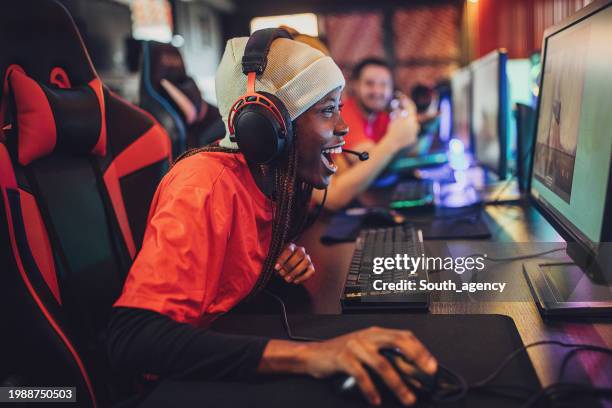 gamers on esports competition - esports stock pictures, royalty-free photos & images