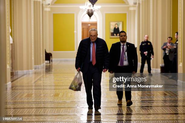 Senate Majority Leader Chuck Schumer walks through the Capitol on February 05, 2024 in Washington, DC. The Senate is working on bringing a bipartisan...