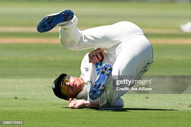 Glenn Phillips of New Zealand fields the ball during day three of the First Test in the series between New Zealand and South Africa at Bay Oval on...