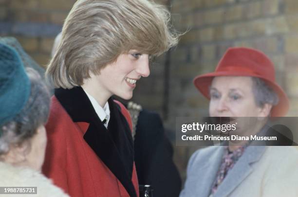 Diana, Princess of Wales , wearing a Catherine Walker coat, smiles at the Charlie Chaplin Adventure Playground for handicapped children in...