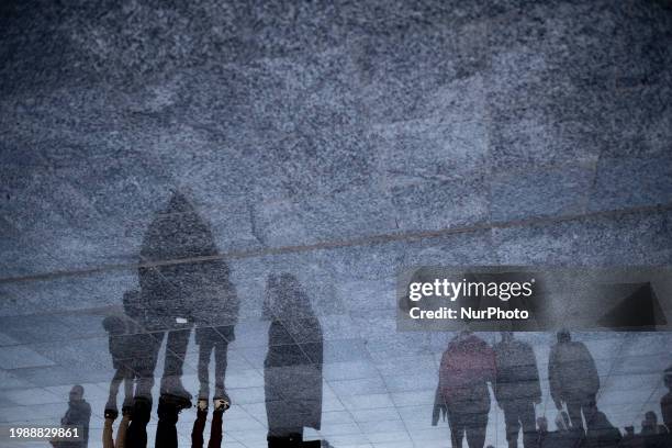 Pilgrims are walking along an area at the holy mosque of Jamkaran on the outskirts of the holy city of Qom, 145 km south of Tehran, after a ceremony...