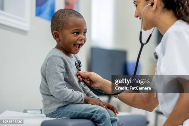 paediatric medical check-up - healthcare and medicine stock pictures, royalty-free photos & images