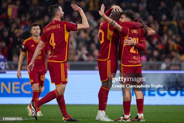 Paulo Dybala of AS Roma celebrates after scoring his team's second goal with his teammate Romelu Lukaku and Lorenzo Pellegrini during the Serie A TIM...