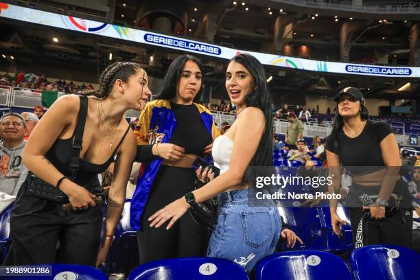 Fans of Tiburones de La Guaira of Venezuela cheer during a game between Venezuela and Mexico at loanDepot Park as part of Serie del Caribe 2024 on...