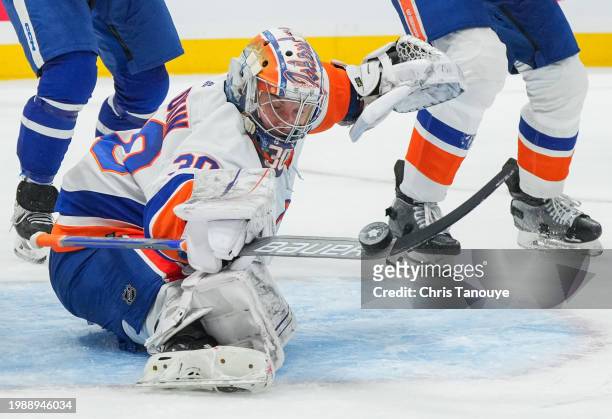 Ilya Sorokin of the New York Islanders makes a stick save against the Toronto Maple Leafs during the second period at Scotiabank Arena on February...