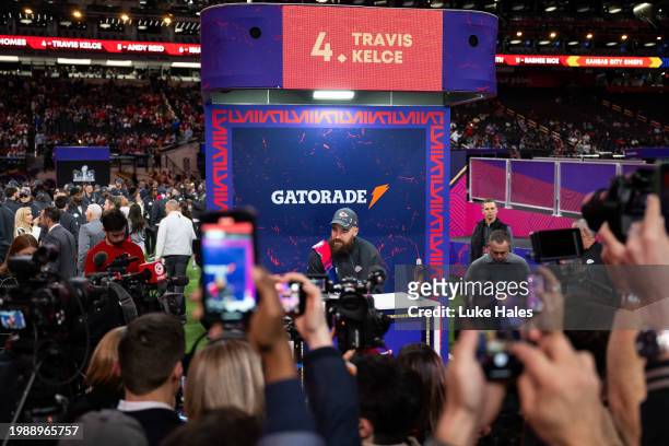 Travis Kelce of the Kansas City Chiefs speaks to the media during Super Bowl LVIII Opening Night at Allegiant Stadium on February 05, 2024 in Las...