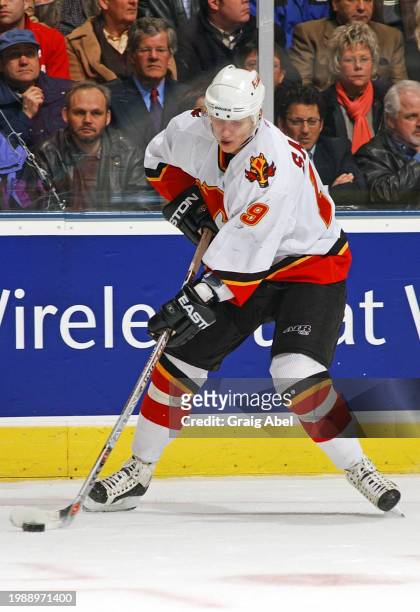 Oleg Saprykin of the Calgary Flames skates against the Toronto Maple Leafs during NHL game action on January 13, 2004 at Air Canada Centre in...