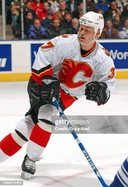 Dean McAmmond of the Calgary Flames skates against the Toronto Maple Leafs during NHL game action on January 13, 2004 at Air Canada Centre in...